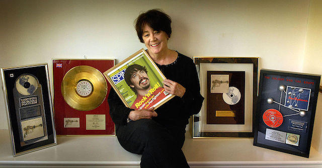 Date: April 18, 2008 Assignment no: 200887 slug: me-mothers1 Springfield, VA mother of rock star Dave Grohl Photographer: Gerald Martineau We photograph Virginia Grohl, mother of guitarist Dave Grohl, lead singer and frontman for the band Foo Fighters. She holds a framed cover of a 1977 SPIN magazine with a picture of her son. Other awards (l-r) Foo Fighters Canadian platinum award for over 100,000 copies sold; 1995 Gold Record from United Kingdon for over 100,000 sold; award from Hong Cong for over 100,000 sold; and aplatinum award given to Virginia Grohl noting over 1 million copies sold of "The Color and Shape." (Photo by Gerald Martineau/The Washington Post/Getty Images)